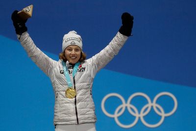 Tributes flow for Olympic champion after death on mountain