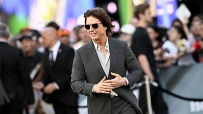 Tom Cruise and Ana de Armas just made it official with hand-holding photos that end months of speculation
