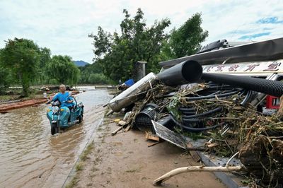 Beijing Officials Admit 'Gaps' In Readiness After Rains Kill Dozens