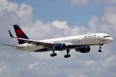 Delta flight makes emergency landing after severe turbulence injures 25 people just two hours into nine-hour journey