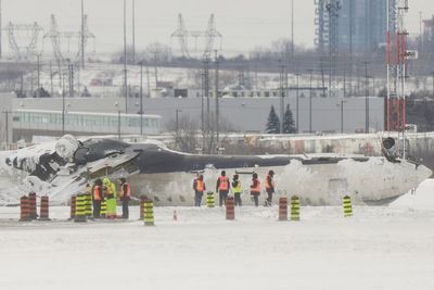 Flight Attendant on plane that flipped over during landing blames ‘inexperienced pilot’ for crash as she sues the airline