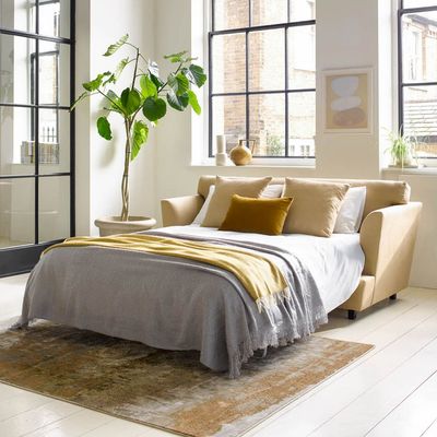 Should you have a sofa bed or an actual bed in a spare room? Help us settle the debate