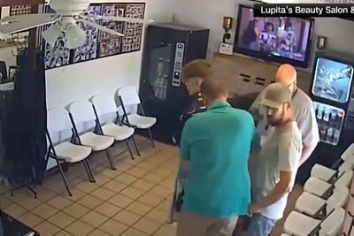 Teacher accused of killing Arkansas couple seen getting arrested at barber shop before admitting to murders, police say
