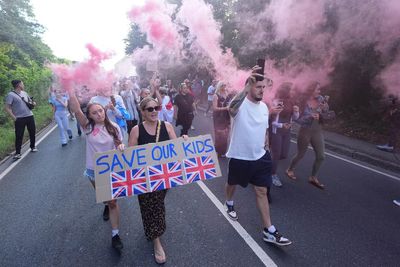 Government accused of plot to silence critics of asylum seeker hotels and 'two-tier' policing