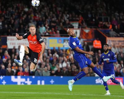 Ryan Johnson’s own goal gives Luton late victory against AFC Wimbledon