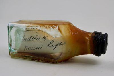 ‘He was so excited’: painter discovers 122-year-old message in a bottle inside Tasmanian lighthouse walls