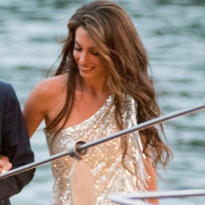 Amal Clooney Trades Vintage Summer Dresses for a Glowing Lake Como Date Night Look