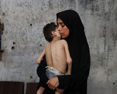 ‘We are dying slowly, save us’: starvation takes hold in Gaza after a week of appalling milestones