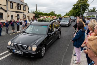 Murdered mother and children ‘together and finally safe’ – funeral hears