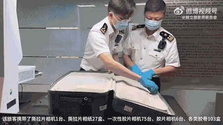 This guy tried to smuggle 80 cameras and 100 boxes of film through customs. He failed
