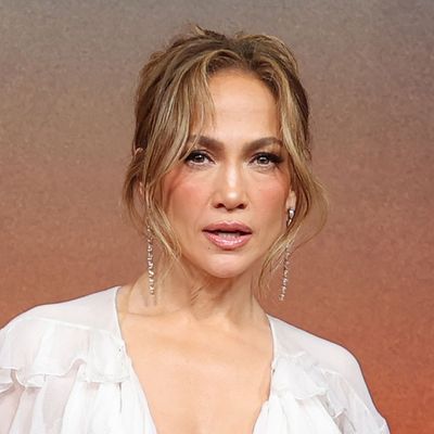 Jennifer Lopez Styles Her $2,600 Prada Mini Dress With $60 Metallic Flip-Flops