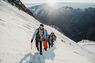 Friendship at 13,000 feet: how climbing in the Swiss Alps is bringing refugees together