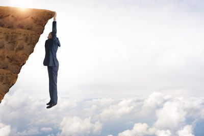 Top economist warns the U.S. is 'on the precipice of recession' — and it will be hard for the Fed to come to the rescue