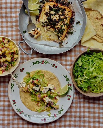 Rukmini Iyer’s quick and easy recipe for baked feta tacos with pink onion and pineapple salsa