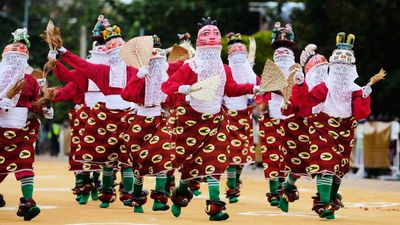 In Pictures: Sacred masks and dancing fill Benin’s capital