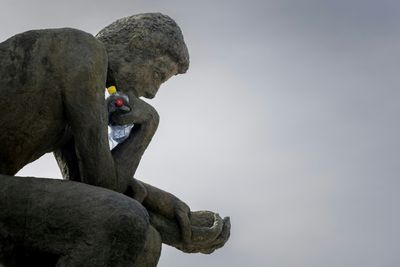 A 'Thinker' Drowns In Plastic Garbage As UN Treaty Talks Open