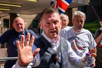 Far-right figure Tommy Robinson arrested for train station assault in UK