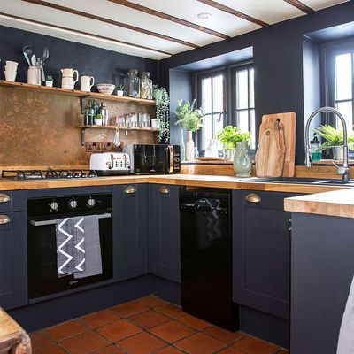 Should you paint kitchen cabinets yourself, or is it a disaster waiting to happen? Help us settle the debate