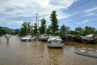 Beijing Lifts Rain Alert After Evacuating Over 80,000