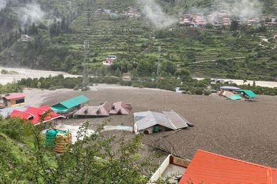 Five dead and over 100 missing after flash flood sweeps away Himalayan village
