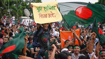 Bangladesh's interim leader says parliamentary election will take place in February