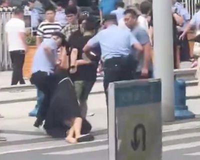 Video shows rare protests in China over beating of schoolgirl by three teenagers