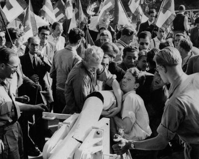 ‘We are Europe’: students burn frontier post in support of a united Europe – archive, 1950