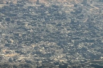 Burnt buildings stretch towards horizon in rare aerial video of Gaza