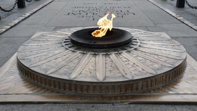Man arrested after lighting cigarette using French war memorial flame