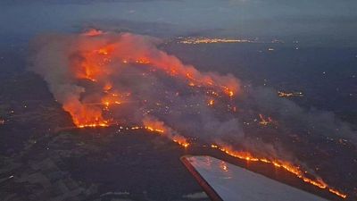 At least one killed as massive wildfire in southern France continues to burn