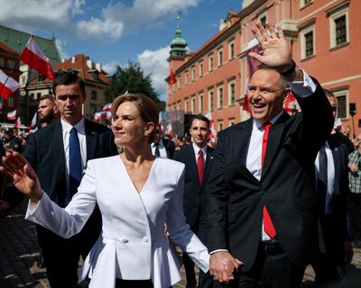 Polish president attacks rivals’ ‘propaganda and lies’ as he is sworn in