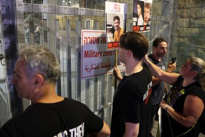 Israeli captive families confront police outside army headquarters