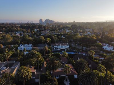 Oakley's billionaire founder is the latest victim of the sluggish luxury housing market—but the profit he could still make shows an underlying problem