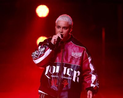 Elite netballers reveal distress after singer who pleaded guilty to domestic violence performs at grand final
