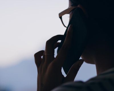 More than half of calls to Queensland domestic violence helpline unanswered for full month last year, report finds