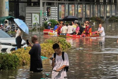 Flash floods kill at least 10 people and leave 33 missing in northwestern China