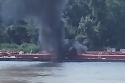 Horrified onlooker films after helicopter hits power lines and crashes into Mississippi river, killing two