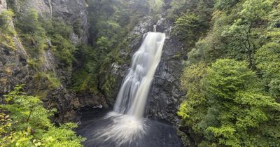 Dog rescued from 140-feet cliff edge at popular Scottish waterfall