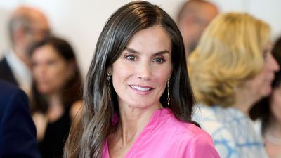 Queen Letizia just styled a breezy candy pink dress with a comfy alternative to summer party heels
