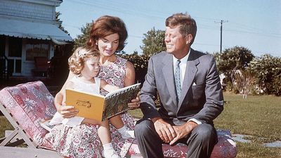 Forget white – the pink lounger on John F. Kennedy and Jackie O's 1960s lawn taps into 2025's hottest outdoor furniture color trend