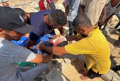 Palestinian boy killed in Gaza aid drop as starvation toll rises to 217