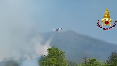 Visible from space: Vesuvius fire has three fronts still active, firefighters continue battle