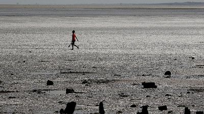 Three teens held on suspicion of murder after man found dead in British beach town