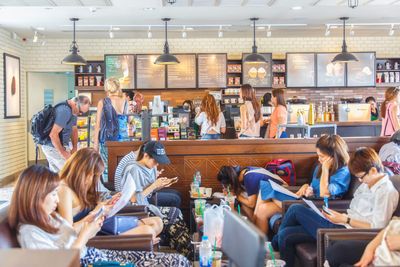 Starbucks asks customers in South Korea to stop bringing printers and desktop computers into stores as workers transform cafes into remote offices