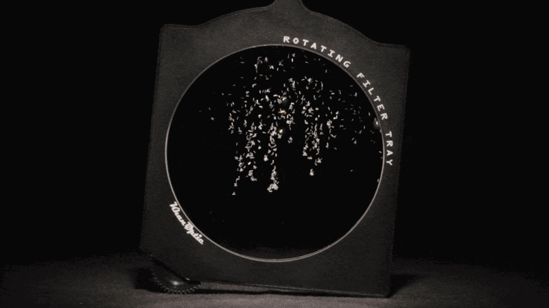 This camera filter is empty, but fill it with anything from glitter to alcohol, and it becomes a mesmerizing, completely customizable look