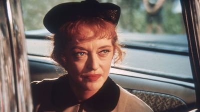 Forget Bette Davis' eyes, her 1950s living room features the romantic trend we're coveting for 2026 – it proves that floral curtains are truly timeless