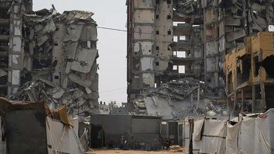 At least 100 Palestinians killed in Israeli attacks across Gaza, health ministry says