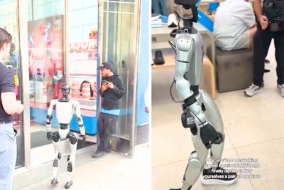 Humanoid robot tries on sneakers at Manhattan store