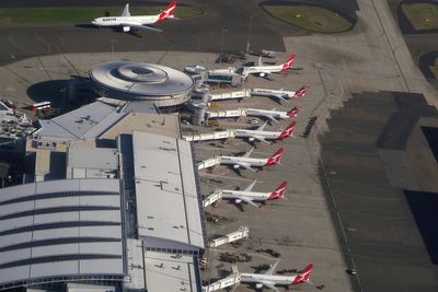 Gunfire at Sydney Airport as police drop rifle during scuffle with man at cafe