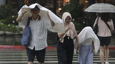Thousands of people evacuated in Taiwan as Typhoon Podul makes landfall
